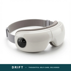 DRIFT heated Bluetooth eye massager, clean studio product photo